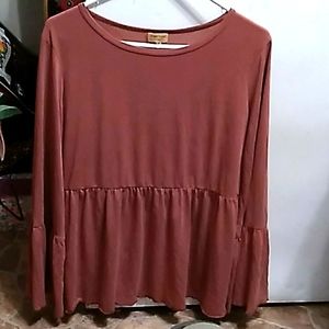 A light pink 1988 piko wide armed shirt